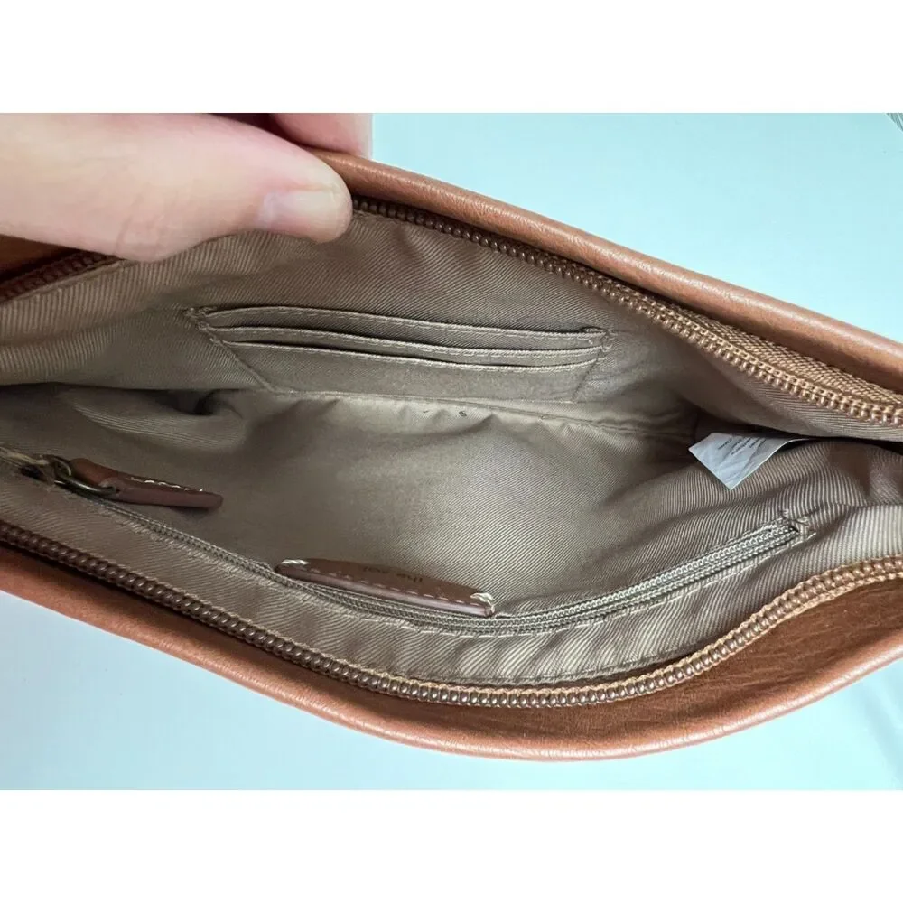 The Sak matte floral embossed tan leather Sanibel crossbody bag